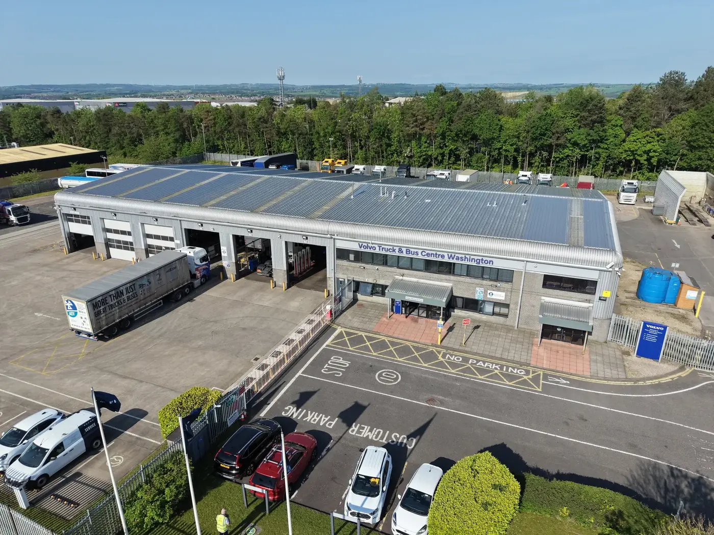 Ageing roof before over-cladding, truck dealership