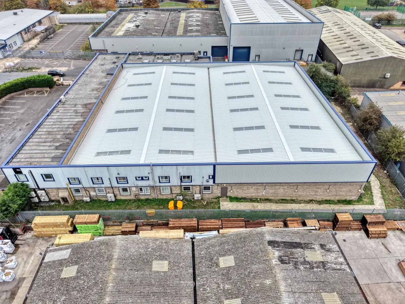Completed building with new composite panel roof