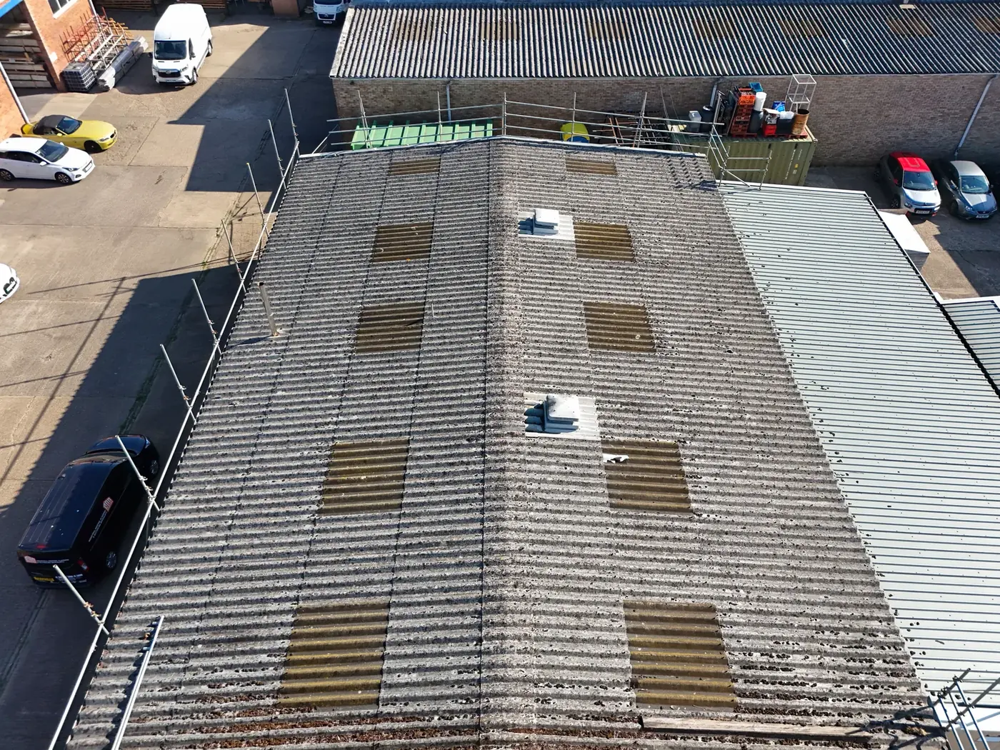 Mossy asbestos cement roof before replacement
